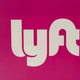 A sign with Lyft's logo.
